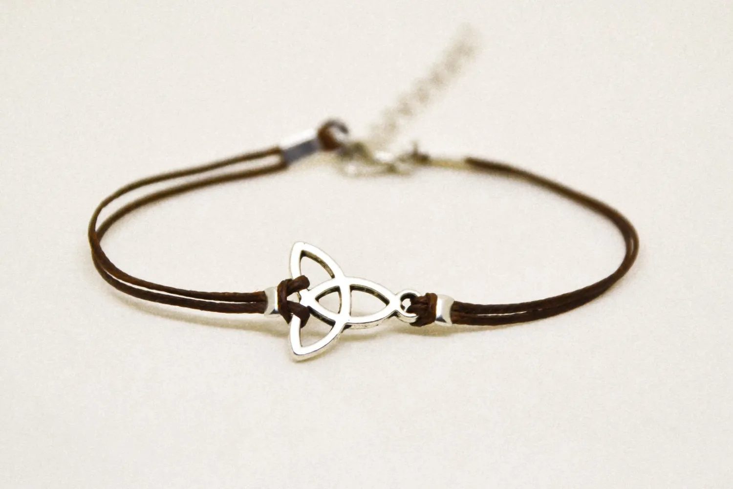 Brown bracelet with silver Trinity charm for women