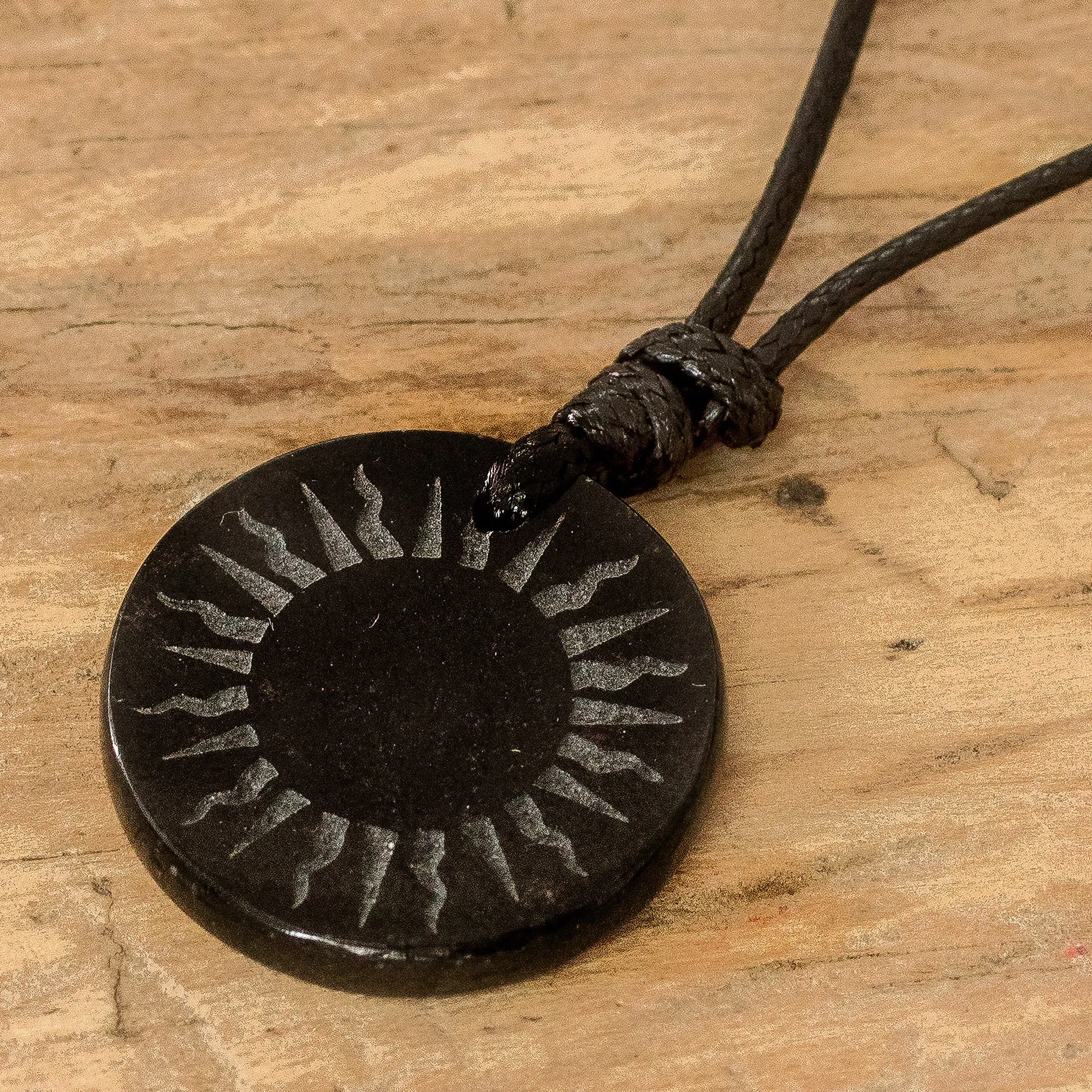 Carved Sun on Black Jade Round Pendant Cord Necklace - Total Eclipse | NOVICA