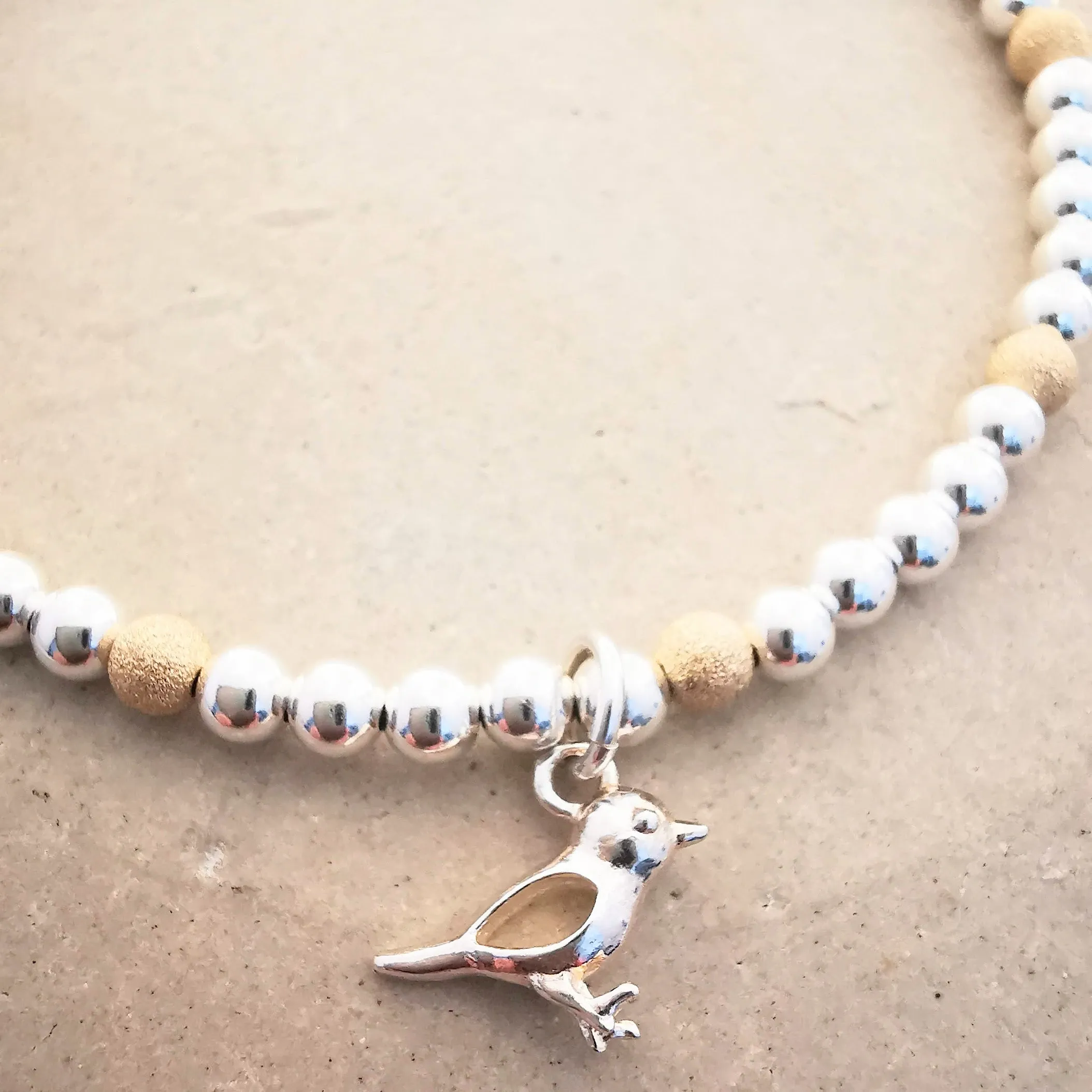 ELLA Silver and Gold Bird Bracelet