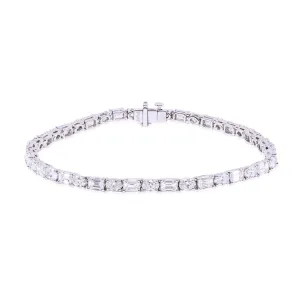 PLATINUM OVAL AND EMERALD-CUT DIAMOND TENNIS BRACELET - 8.40CTW