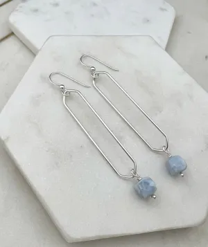 Sterling silver oval hoops with blue opal